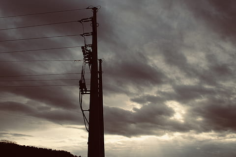 Electric Post Under Gray Sky, dark clouds, dawn, electric current HD wallpaper