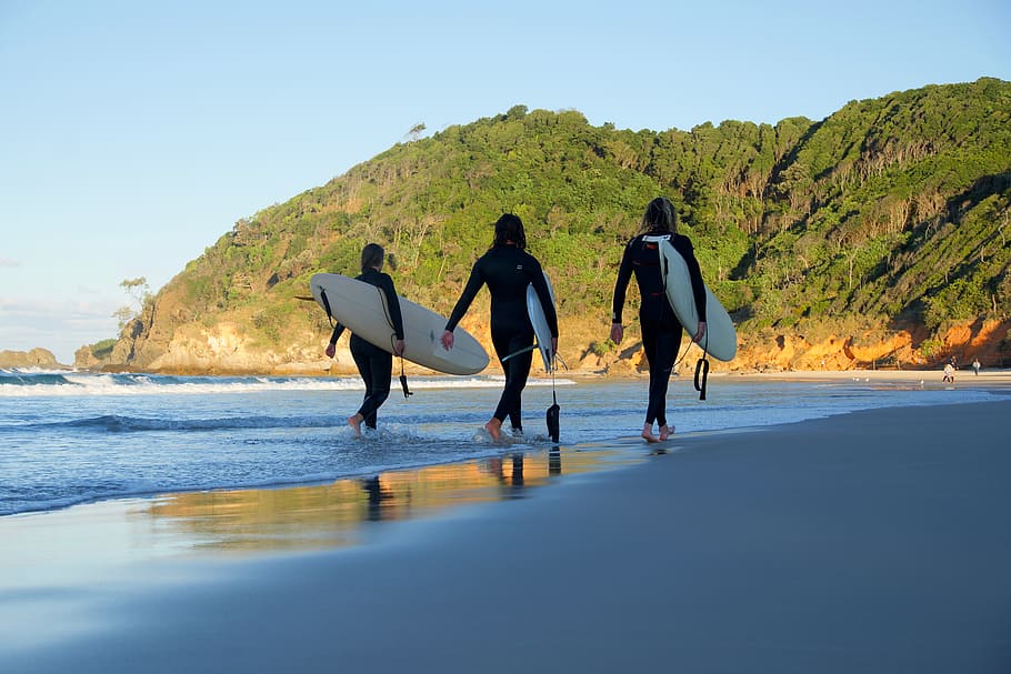 surfers, beach, sand, water, bright, sea, ocean, two people HD wallpaper