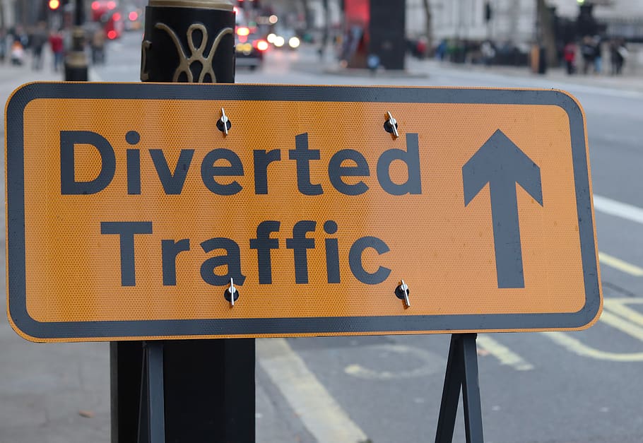 close-up of Diverted Traffic signage, symbol, road sign, london