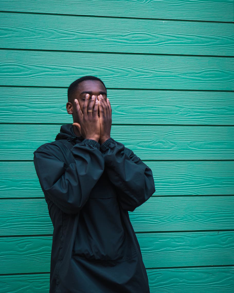man standing covering her face, human, person, people, shoreditch HD wallpaper