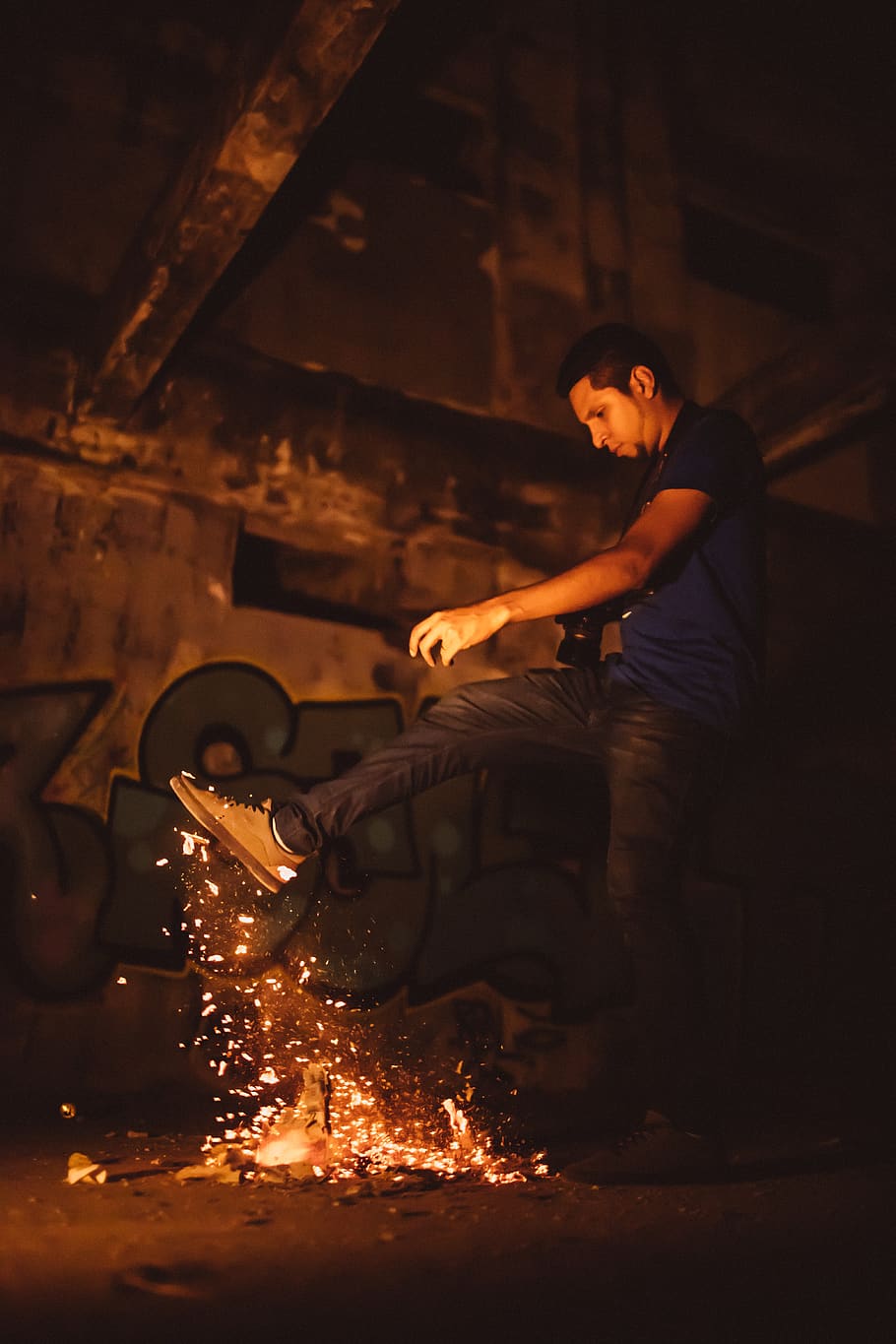 Man Kicking Bonfire, burning, dark, flame, graffiti, heat, hot HD wallpaper