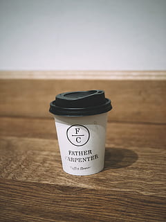 shallow focus photo of coffee cup on brown wooden surface, table HD wallpaper