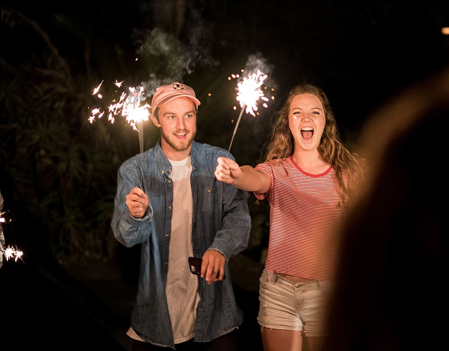 two people, night, togetherness, illuminated, sparkler, bonding HD wallpaper