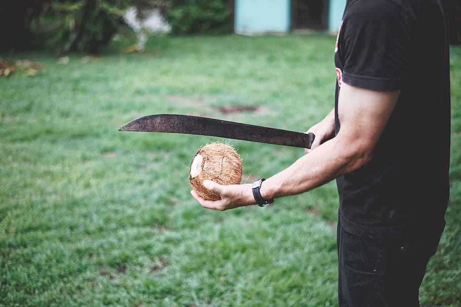 person holding coconut shells, human, apparel, clothing, sphere HD wallpaper