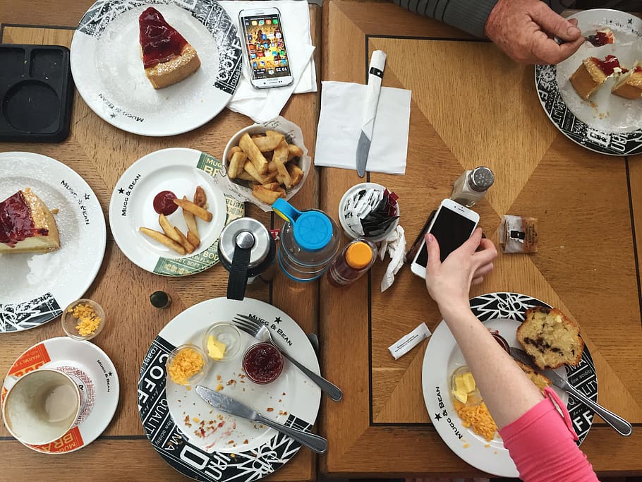 Person Holding Iphone on Table, brown, cake, cheesecake, close-up HD wallpaper