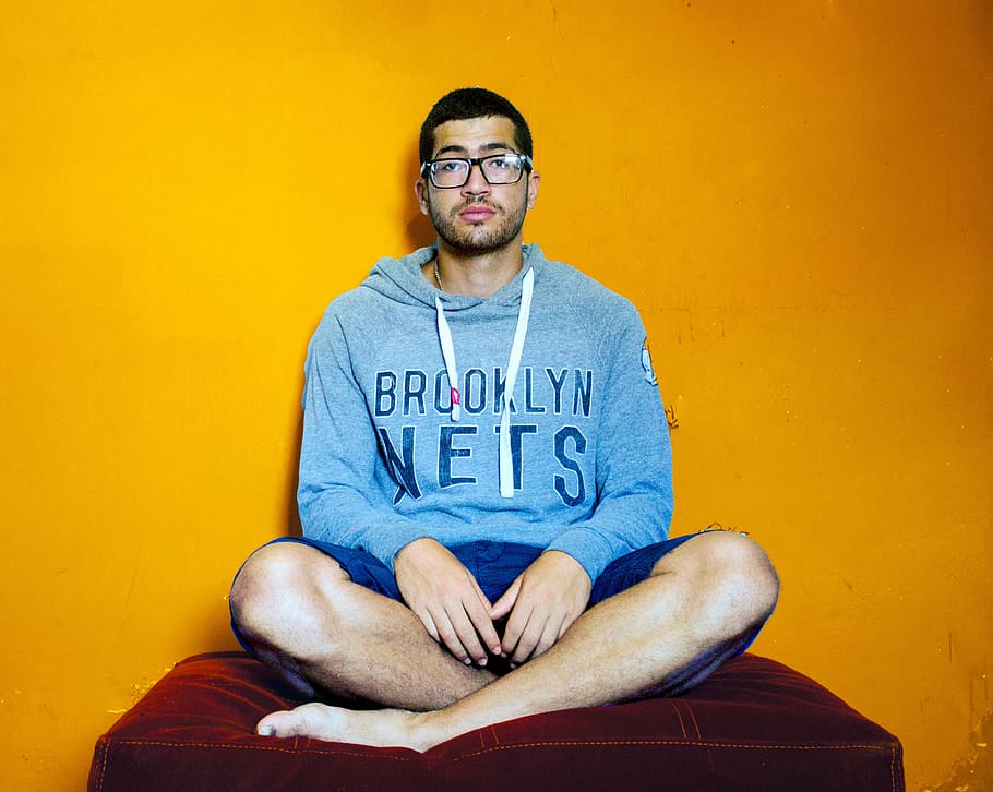 algeria, man, one person, front view, sitting, eyeglasses, casual clothing HD wallpaper