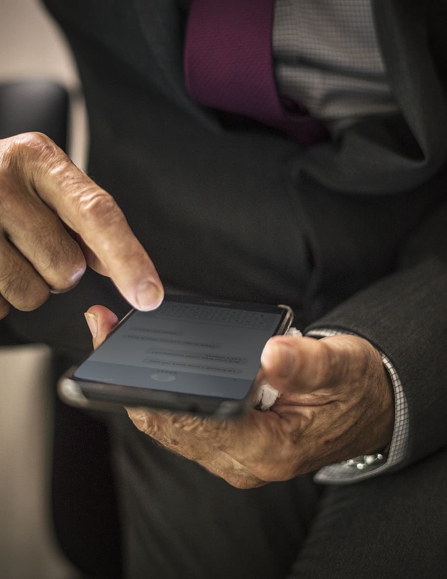 Person Holding Black Smartphone, hands, screen, human hand, one person HD wallpaper