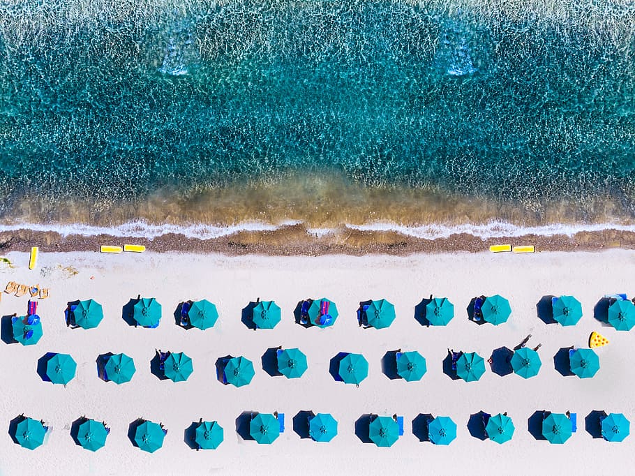 bird's eye view of seashore, beach, ocean, umbrella, vaction