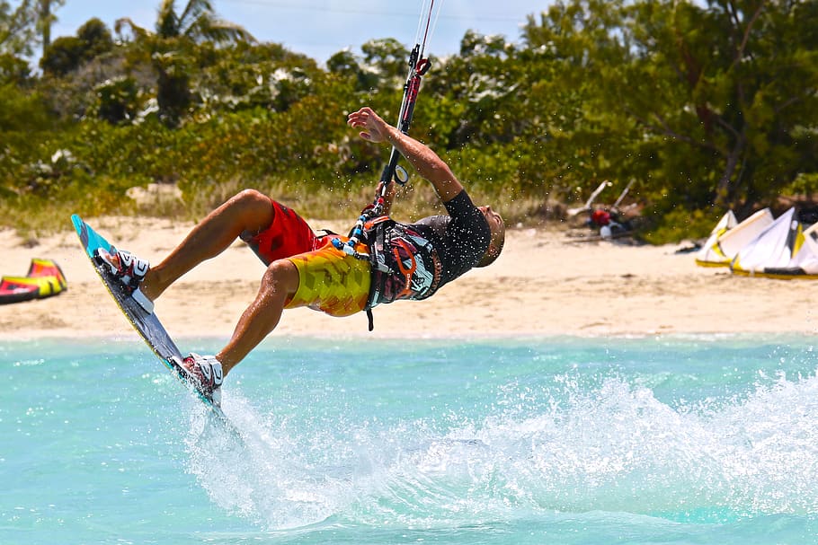 Man in Wakeboard, action, beach, daylight, enjoyment, fun, grass HD wallpaper
