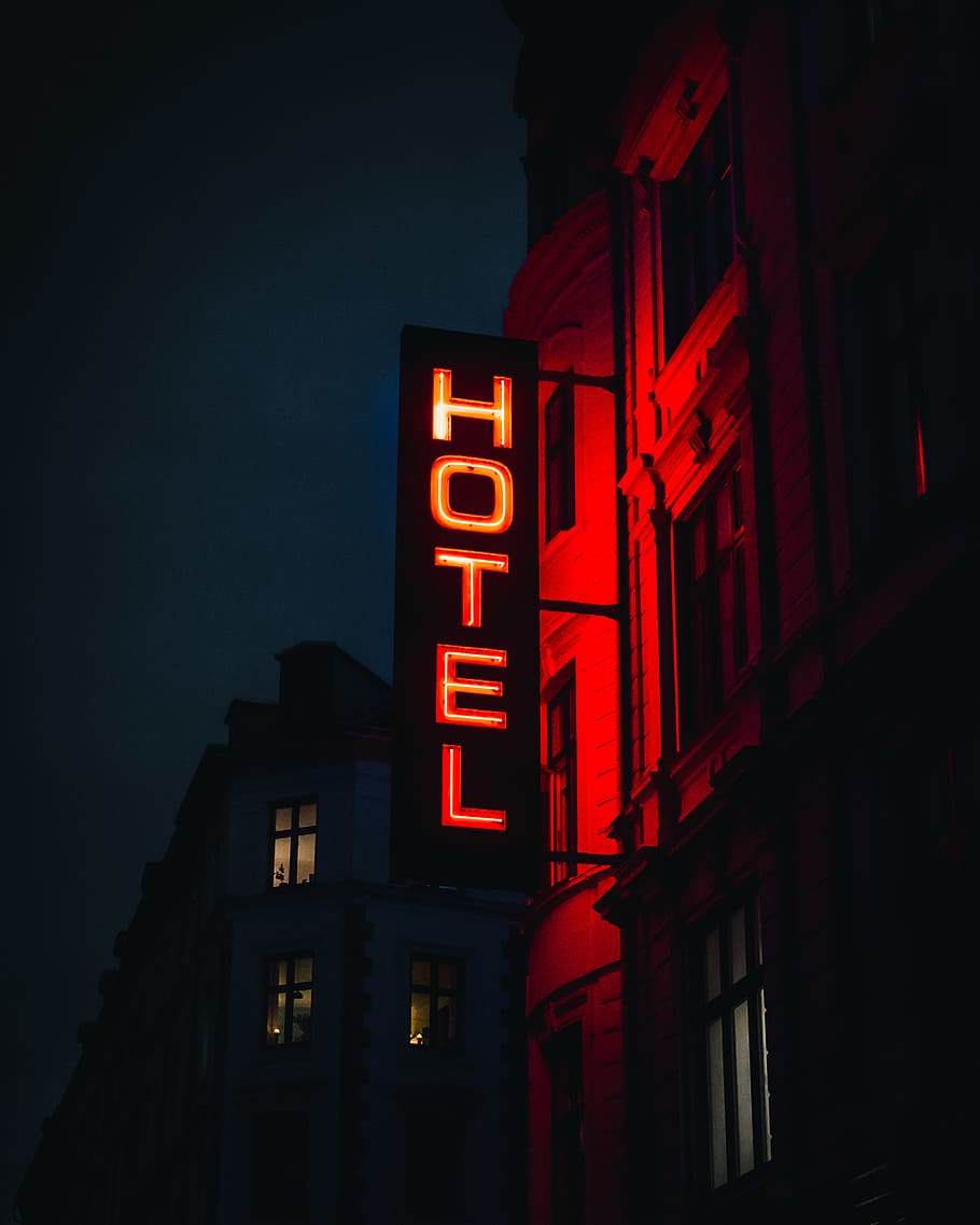 turned-on Hotel LED signage, illuminated, night, neon, red, architecture