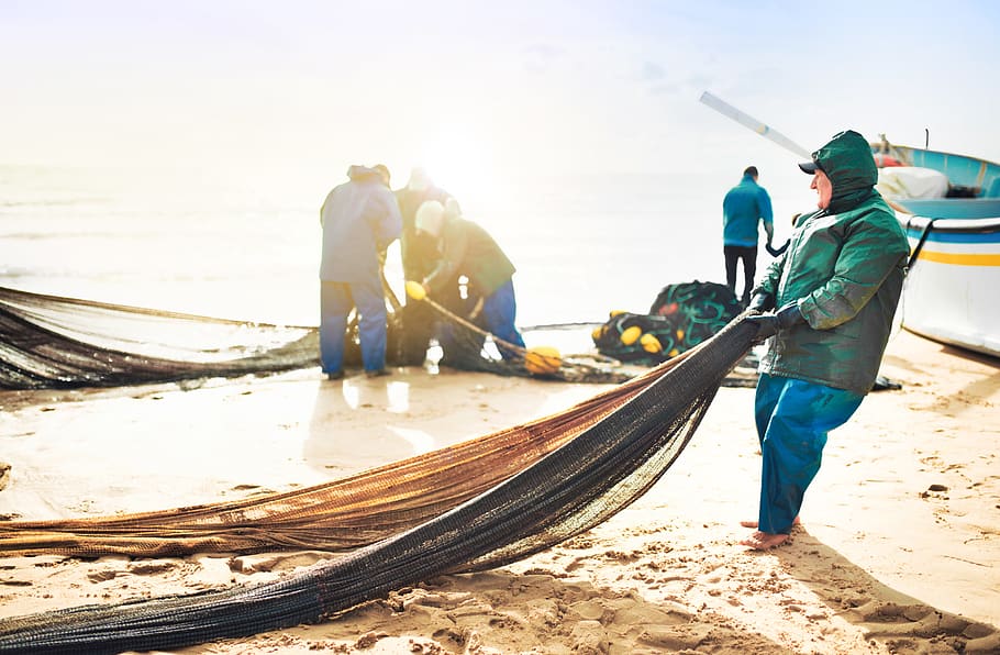 person pulling fishing net, human, furniture, apparel, clothing HD wallpaper