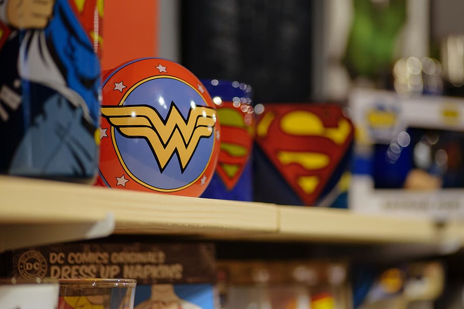 Wonder Woman mugs, person, human, sphere, toy, shelf, people