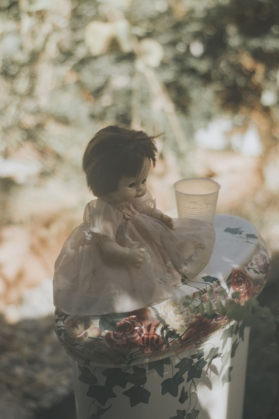 doll beside cup, one person, women, real people, child, focus on foreground HD wallpaper