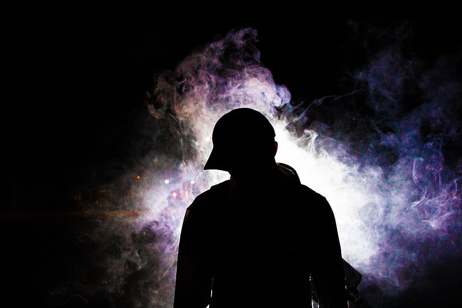 Silhouette Photography of Smoke Behind Person, backlit, cap, colors
