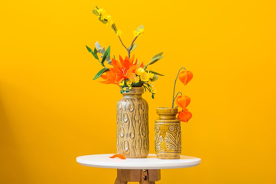 red flowers on brown vase, flowering plant, orange color, colored background HD wallpaper