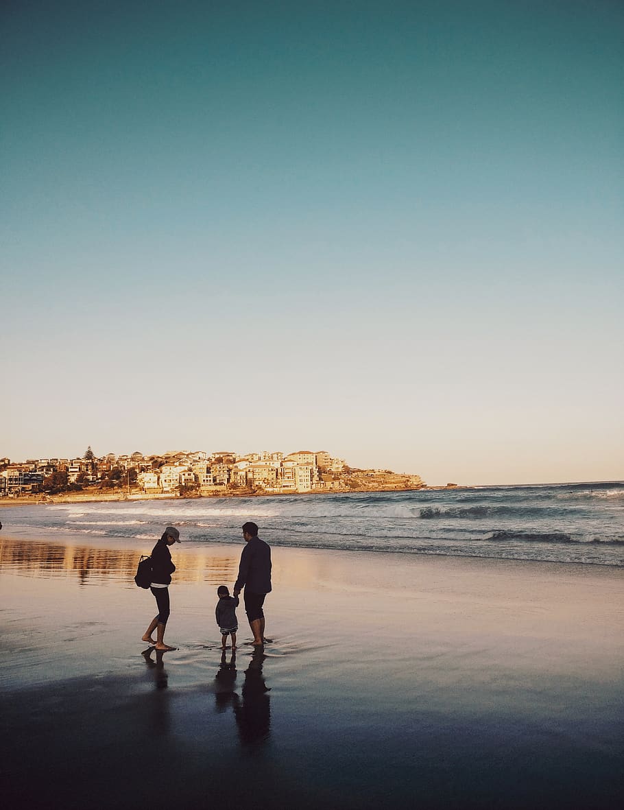 Man and Woman Walking With Boy in Seashore, beach, child, dawn HD wallpaper