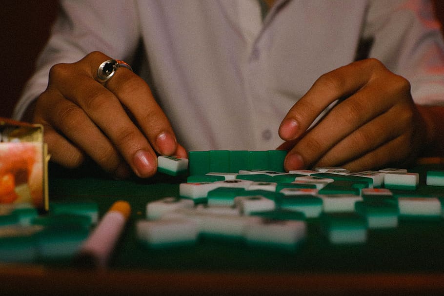 person playing scarbles, human, game, finger, gambling, wristwatch HD wallpaper