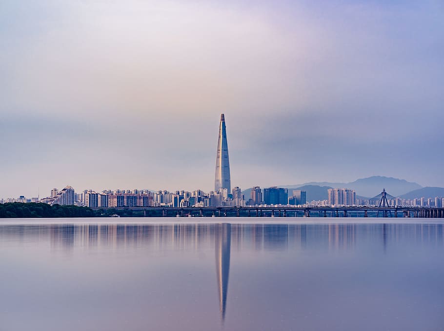 landscape photo of cityscape during daytime, building, water HD wallpaper