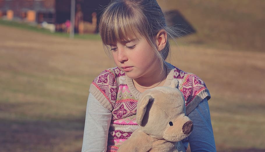 Girl Holding Brown Teddy Bear, blond, child, cute, daylight, field HD wallpaper