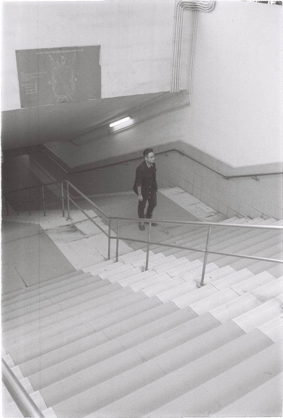 man walking upstairs, banister, handrail, person, human, staircase HD wallpaper