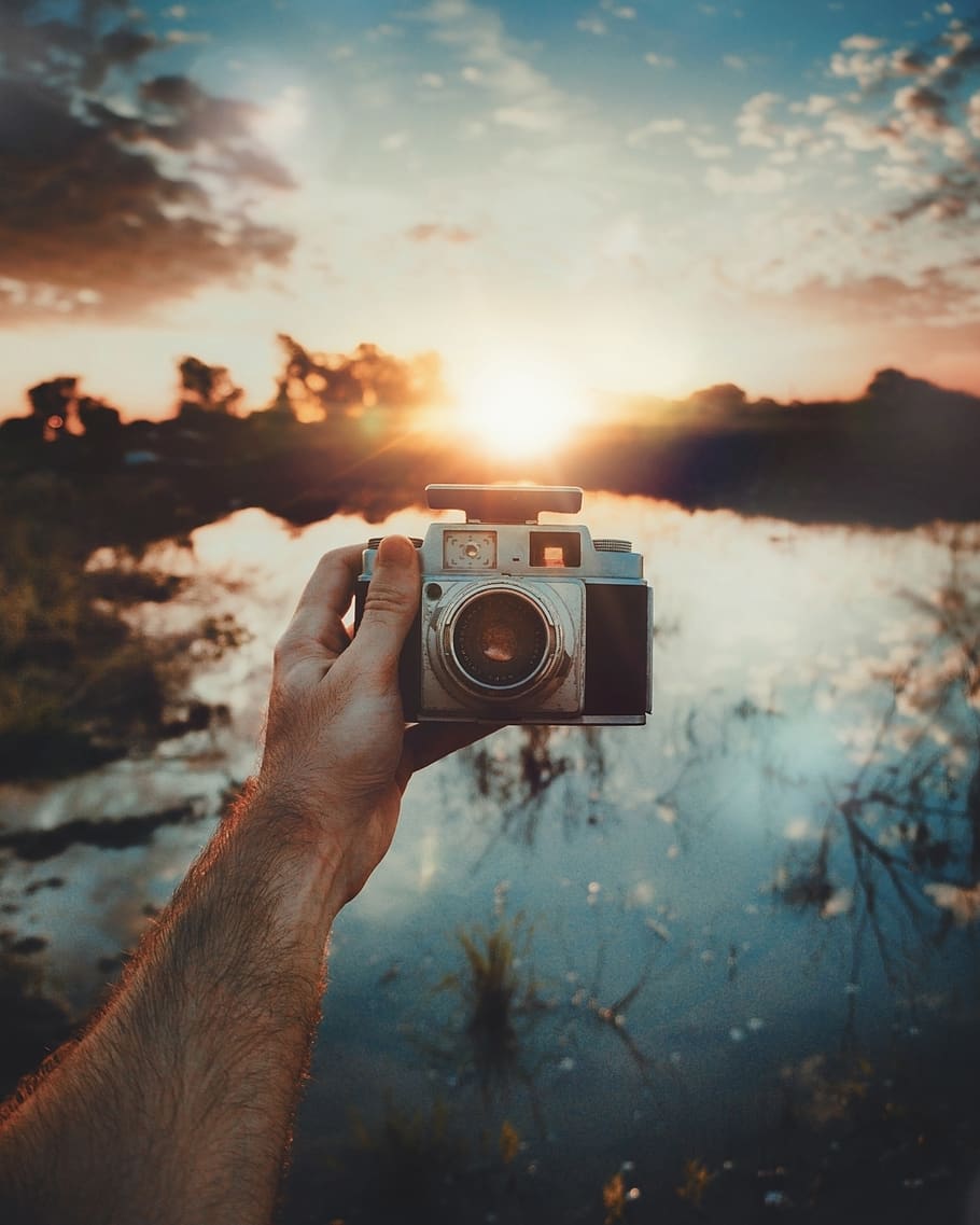person showing grey bridge camera, electronics, human, photography HD wallpaper