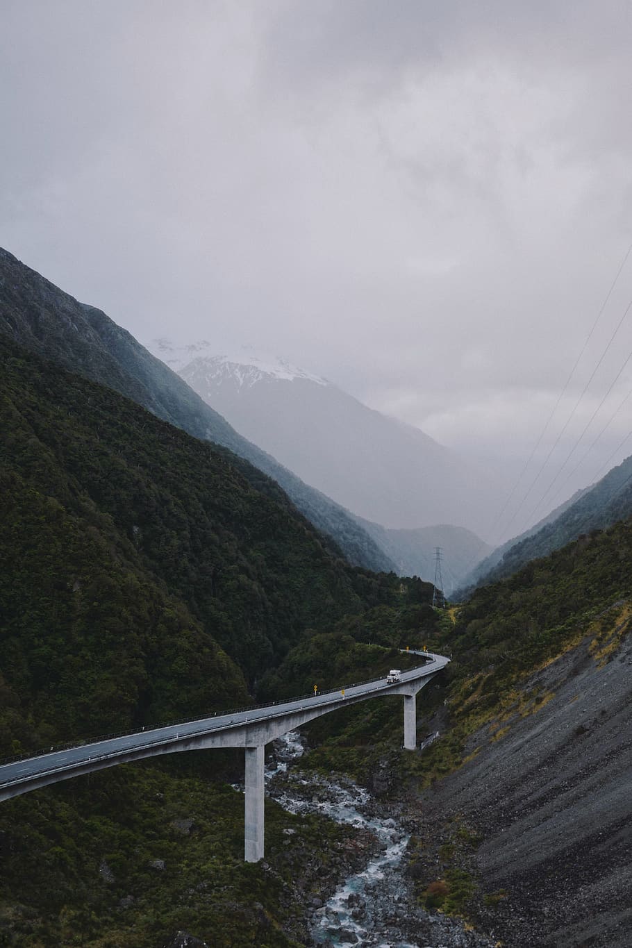 bridge in between mountains under grey sky, road, way, nature HD wallpaper