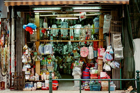 Person Wearing White Tank Top Inside His Store, bargain, bazaar HD wallpaper