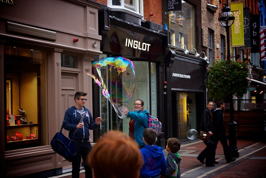 Person Holding Bubble, city, fun, kids, people, soap, architecture HD wallpaper