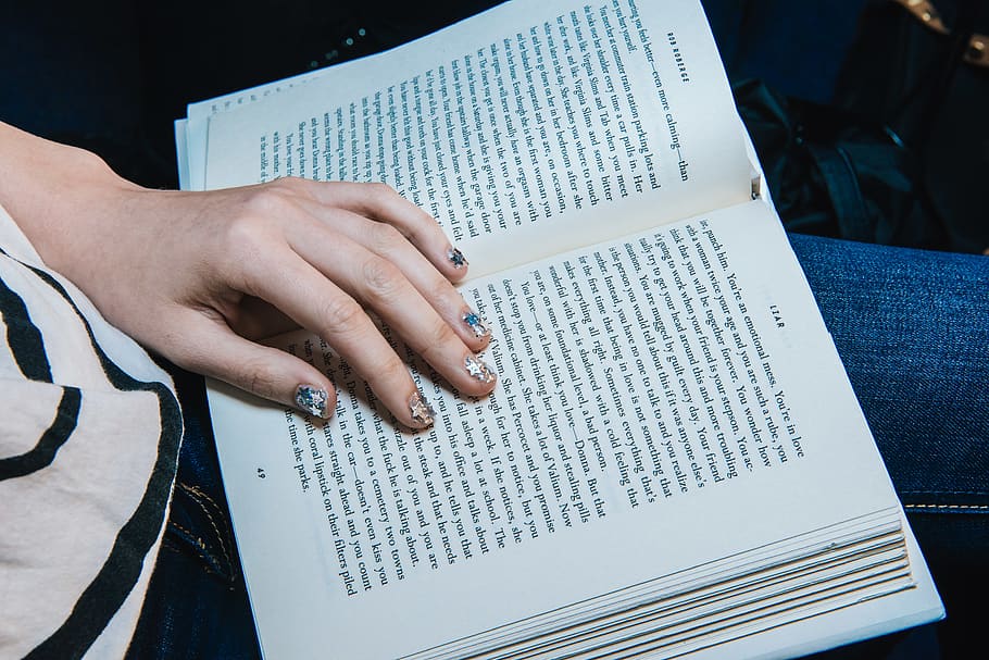 person reading on opened book, human hand, publication, human body part HD wallpaper