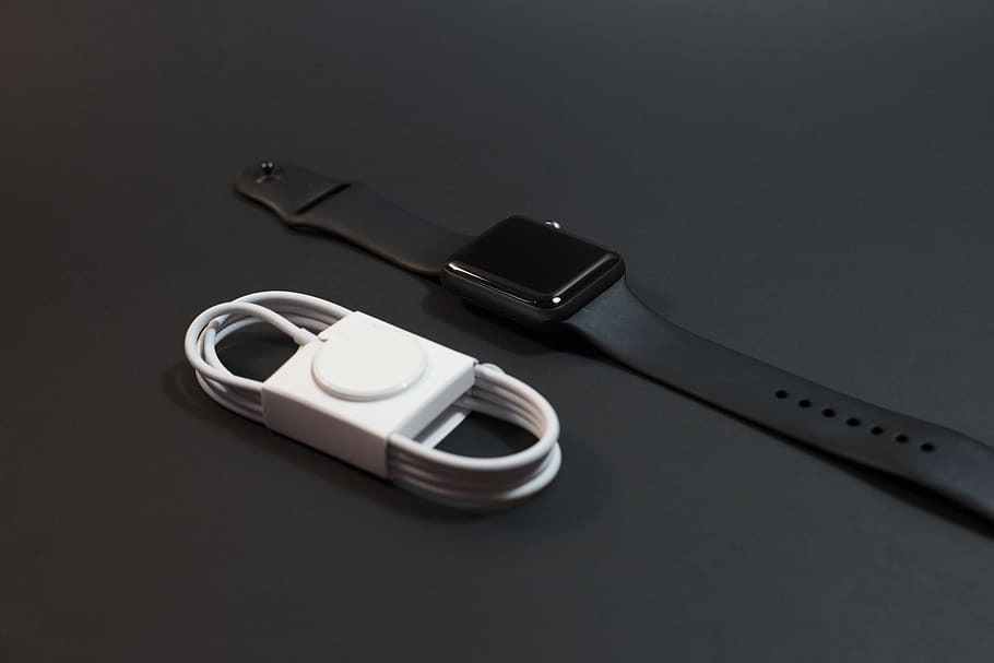 Black Aluminum Case Apple Watch With Sport Band Beside Magnetic Charger, HD wallpaper