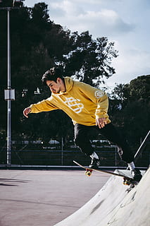 man riding black skateboard doing tricks, person, human, sport HD wallpaper