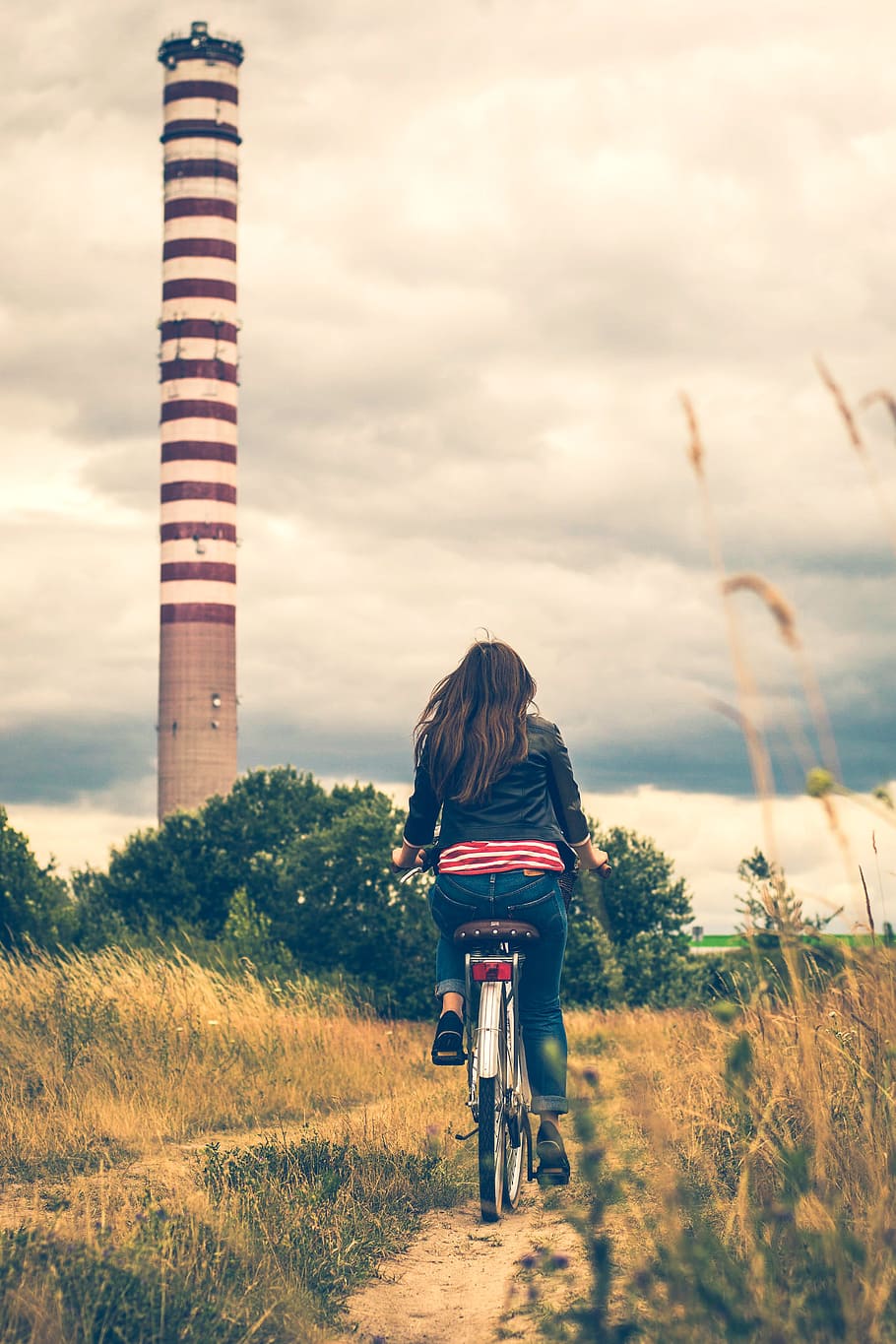 Woman Riding Bicycle Near Lighthouse, biking, daylight, footpath HD wallpaper