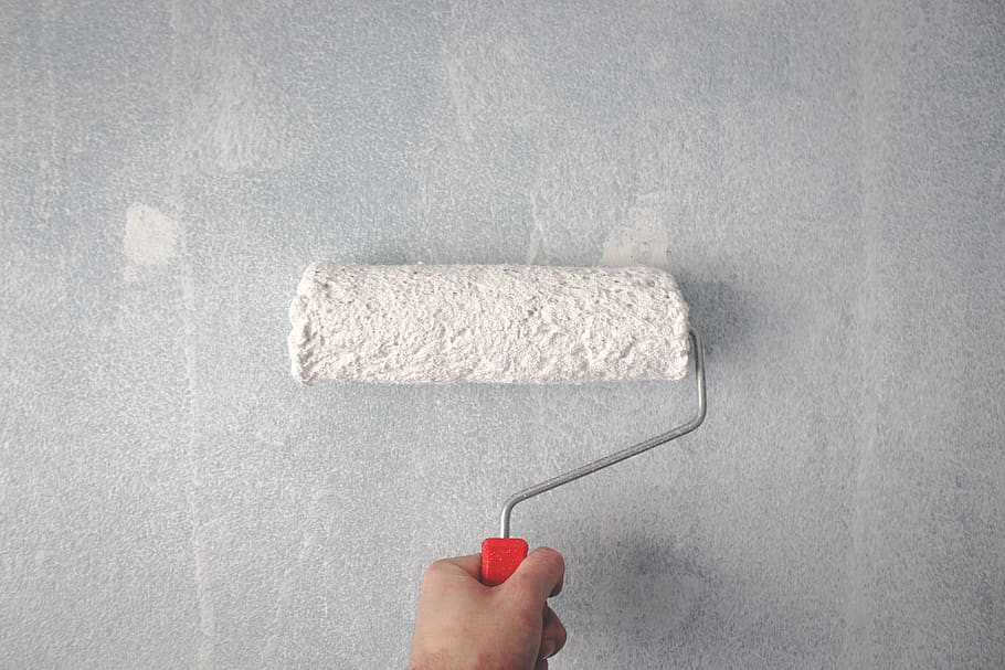 Person Holding Paint Roller On Wall, hand, painting, human hand