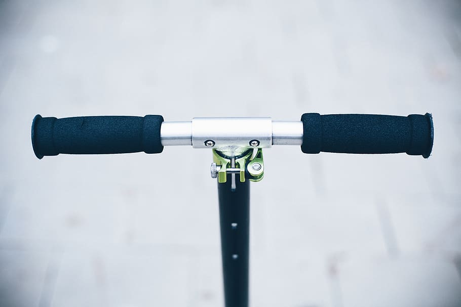 Close-up Photo of Kick Scooter Handlebar, no people, focus on foreground HD wallpaper