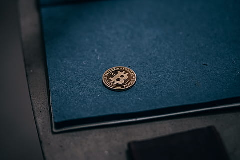 Gold-Plated Bitcoin Against a Blue Draft Board. Grungy Texture Blue Draft Board. HD wallpaper