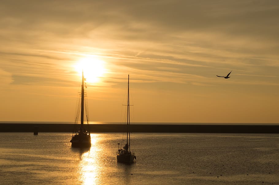 Two Boat on Ocean during Golden Time, backlit, beach, boats, clouds HD wallpaper