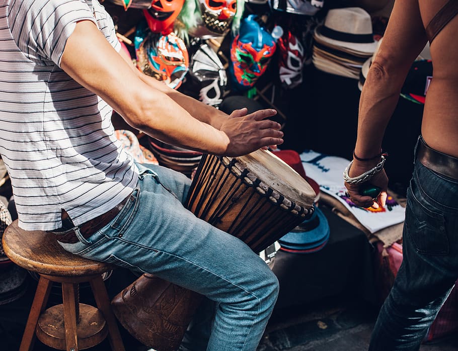 Man Sitting on Chair Playing Drum, fun, market, masks, music HD wallpaper