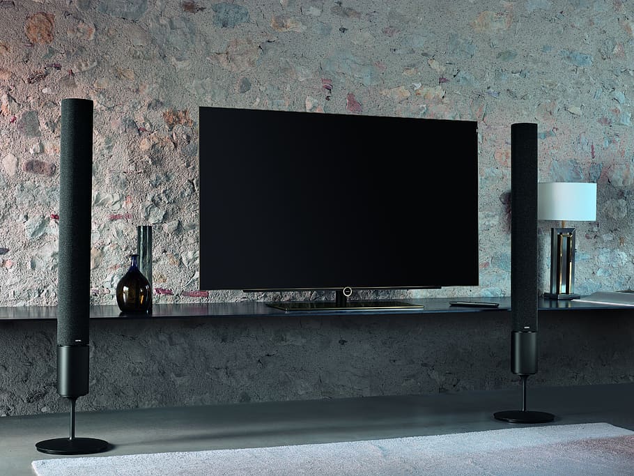 flat screen television with tower speakers, wall - building feature HD wallpaper