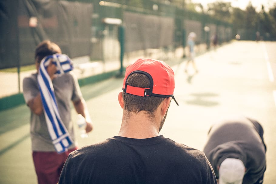 man wearing red cap, person, human, people, plaid, tartan, team sport HD wallpaper