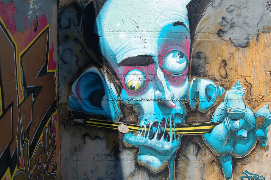 Graffiti art of a character with a messed up looking face., wall street art in a public place, HD wallpaper