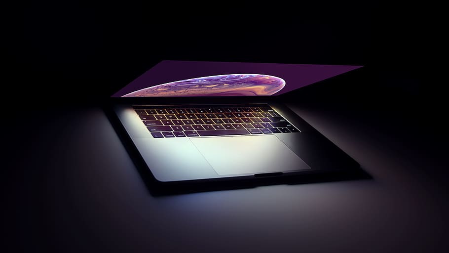 MacBook Pro turned-on, computer, laptop, screen, light, glow