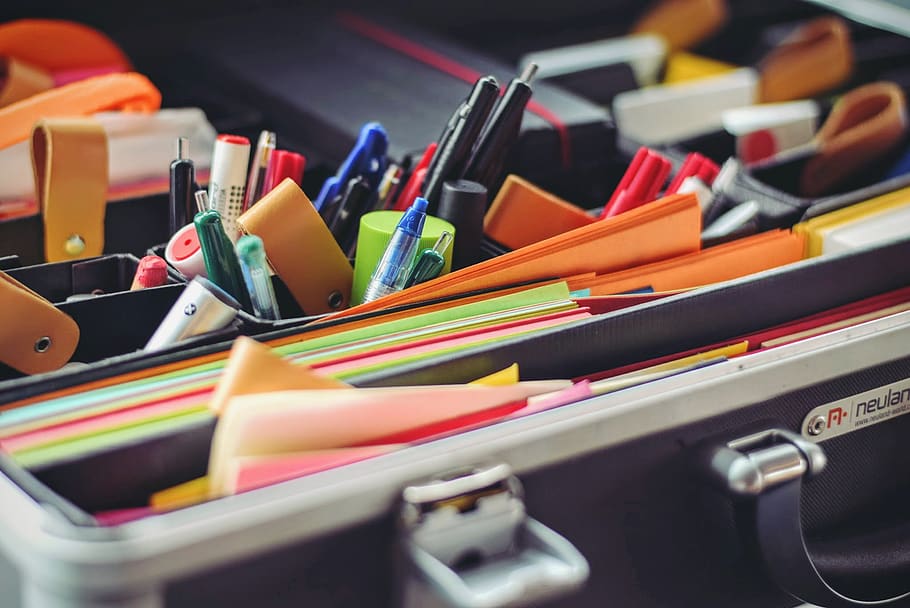 assorted pen and colored papers in organizer case, multi colored HD wallpaper