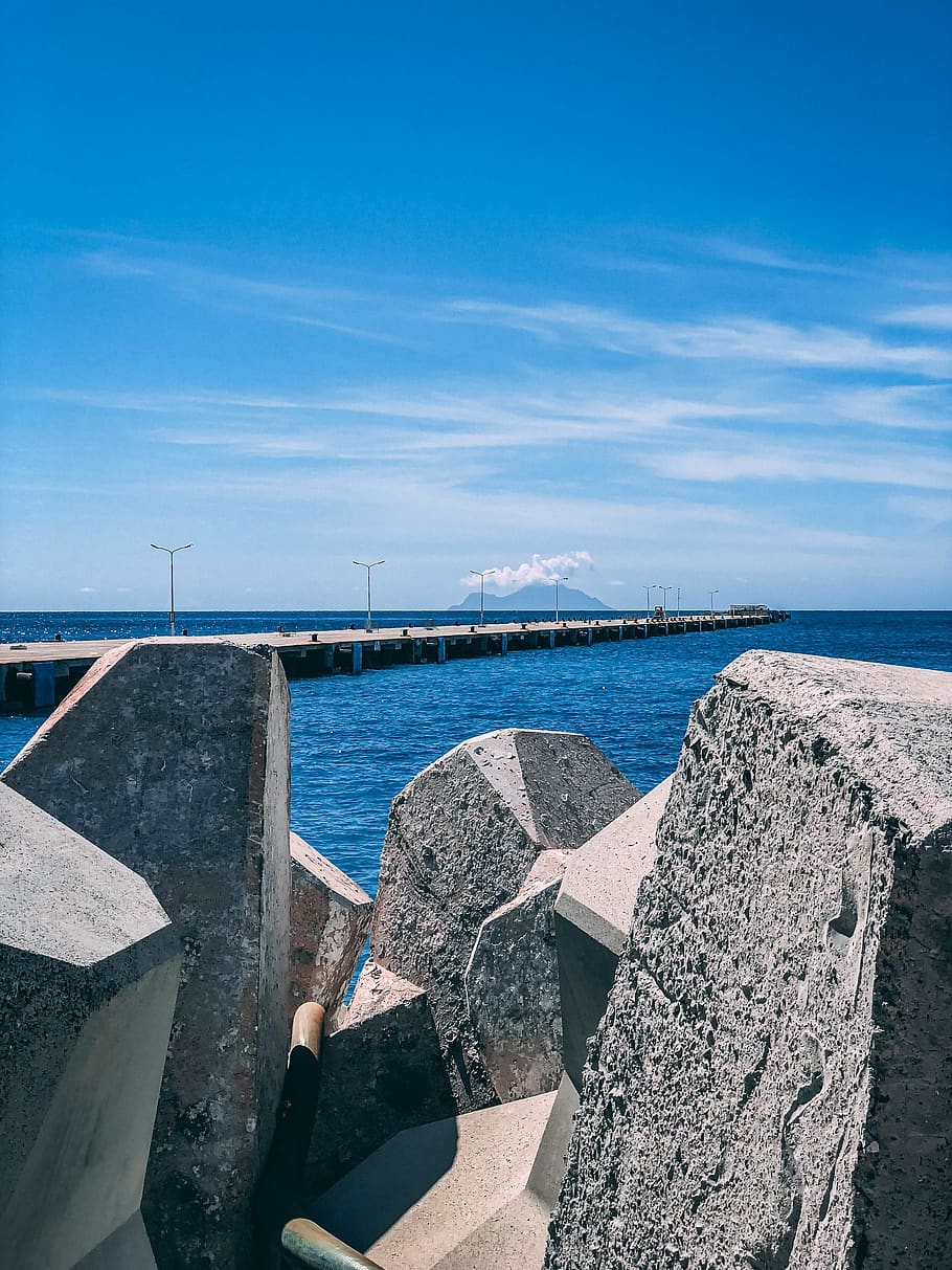 water, waterfront, dock, pier, port, building, promontory, rocks HD wallpaper