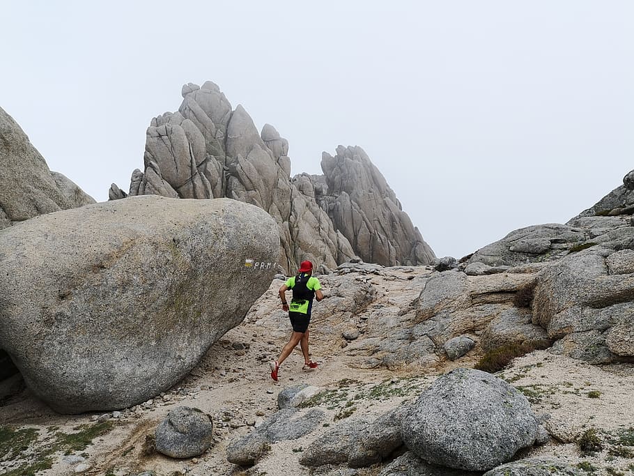 person running between rock formations, human, madrid, sport HD wallpaper