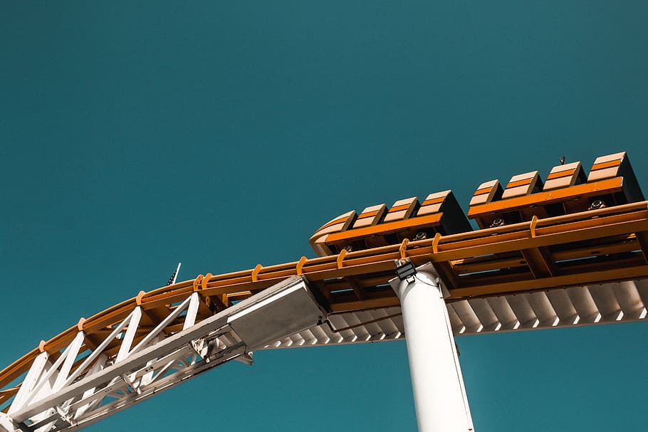 worm's-eye view of orange roller coaster, sunlight, shadow, sky HD wallpaper