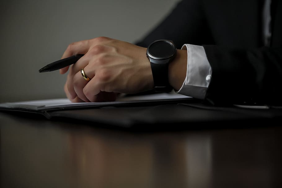 Person Holding Black Pen, adult, composition, corporate attire