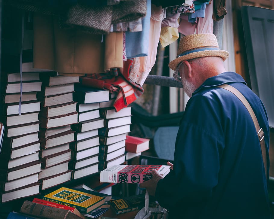 people, man, books, read, display, clothes, store, retail, real people HD wallpaper