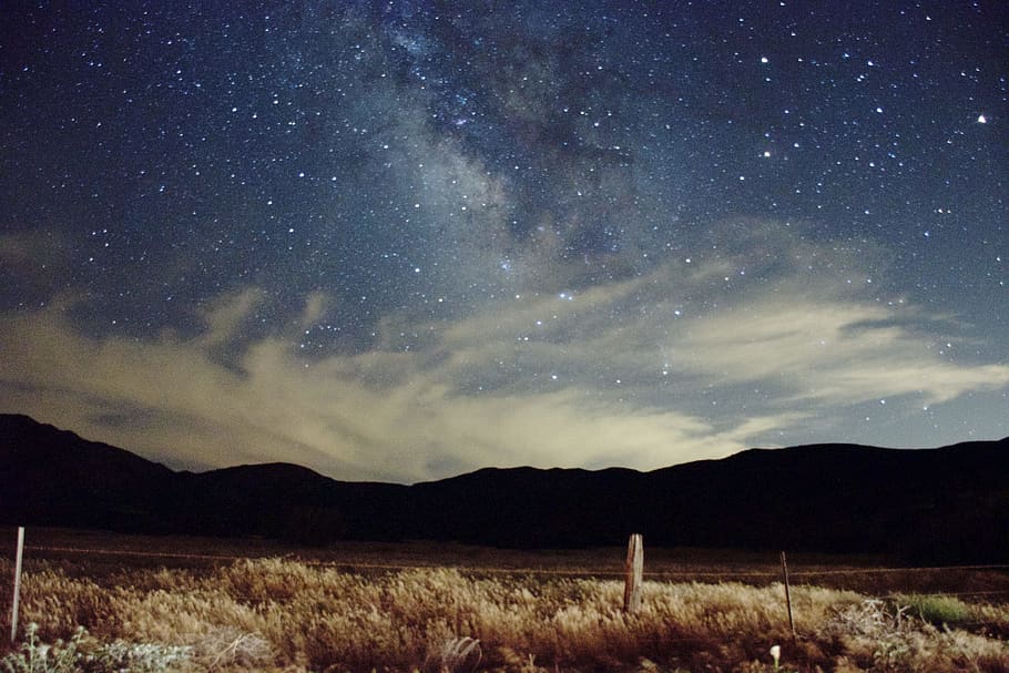nature, mountains, slope, grass, night, sky, clouds, stars HD wallpaper