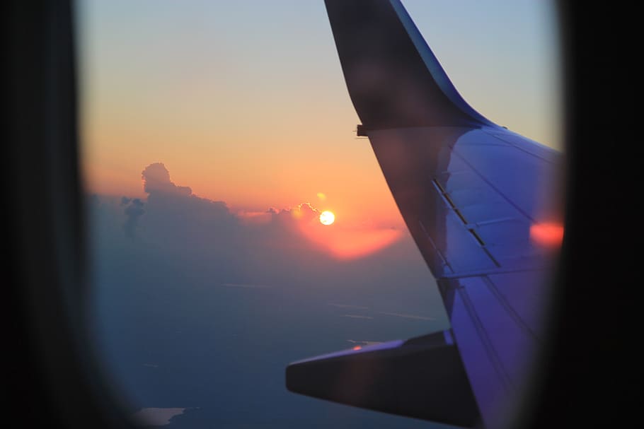 grey airplane wing, sunset, airplane window, sunrise, aircraft