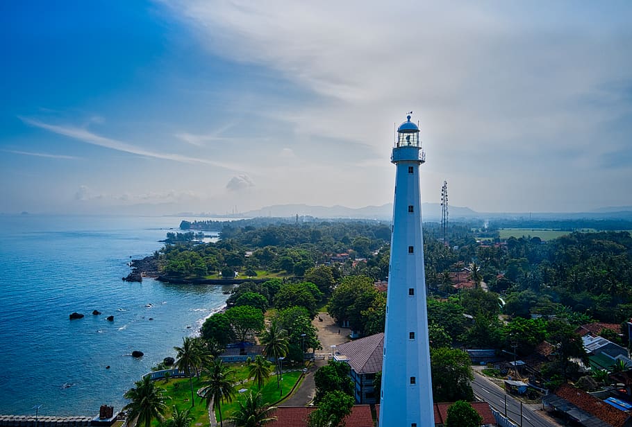 Scenic Photo Of Lighthouse Near Sea, beach, blue sky, blur, building HD wallpaper